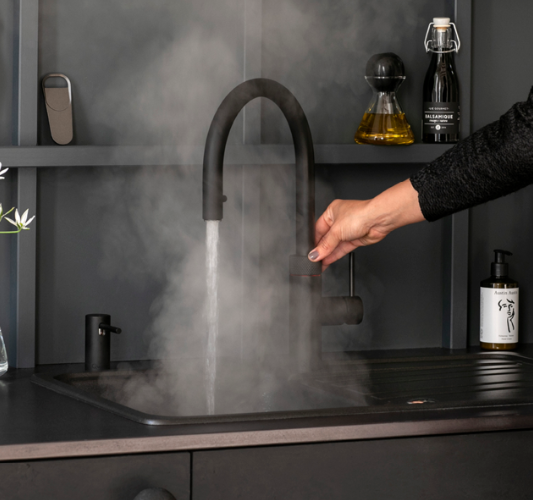 Quooker kitchen boiling tap, in black to match the aesthetic of a contemporary kitchen, offered by Design Time in Nottingham